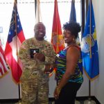 Omni Financial Hinesville, GA: Customer SFC Jaime Ruffin with Customer Care Specialist Kyoko Fripp