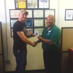 Omni Financial Killeen, TX: Customer Donald McCrary, with General Manager Keith Collands